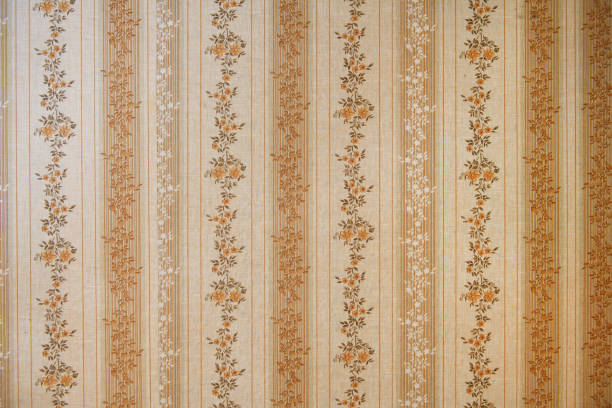 istock Old wallpaper on the wall. Old wallpaper for texture or background. 2166708143