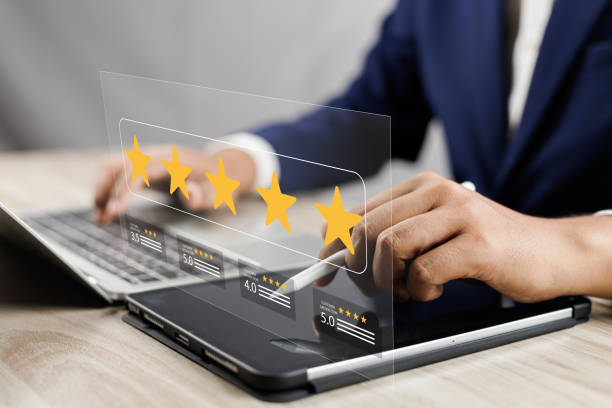istock Evaluating 5-Star customer satisfaction, Online survey for quality service experience online application, Satisfaction with service evaluation, 5-Star rating and quality service feedback online. 2166708233
