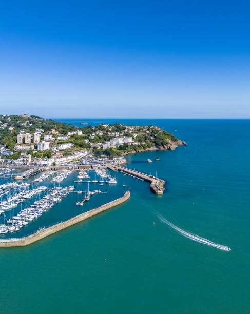 istock Boat leaves Torquay Harbour 2166711747