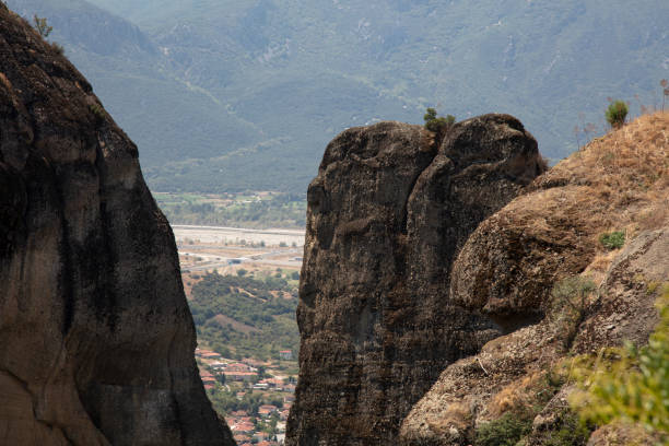 View of monastery and rock formations in Meteora, Greece