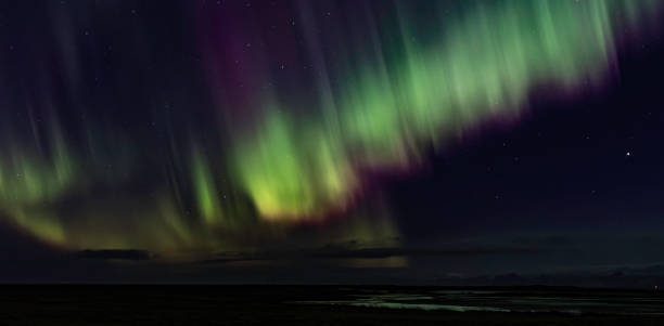 istock The sky is filled with a beautiful display of auroras 2166714421
