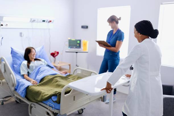 istock Medical workers checking on their pregnant patient 2166718419