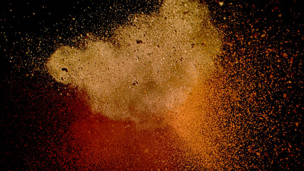 istock Earth-Toned Particle Explosion on Black Background 2166722218