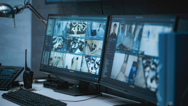 istock CCTV footage from security cameras with face scanning on computer monitors 2166722283