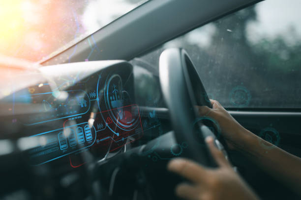 Futuristic Car Dashboard with Digital Interface Close-up of hands on steering wheel with futuristic digital dashboard display, showcasing advanced vehicle technology and interface. concept car stock pictures, royalty-free photos & images