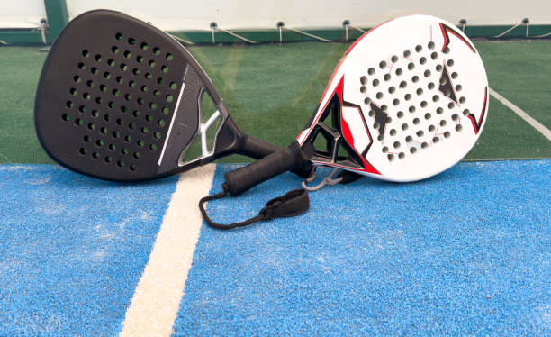 istock paddle rackets on the playing court 2166723681