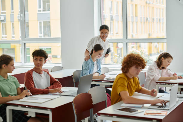 istock Teenage students engaged in collaborative learning activities in a bright classroom setting 2166731281