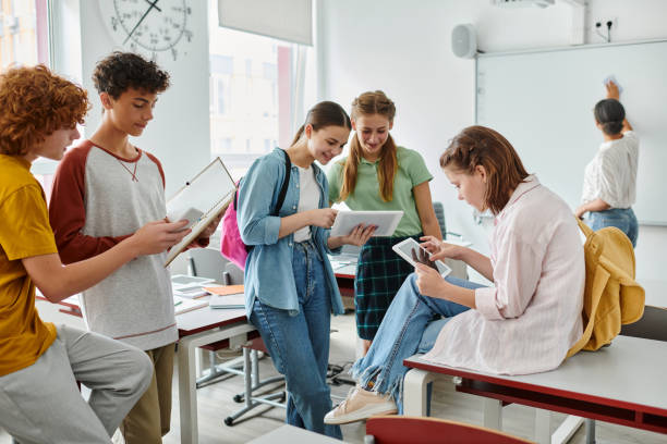 istock Teenage students engaged in collaborative learning in a modern classroom setting 2166731441