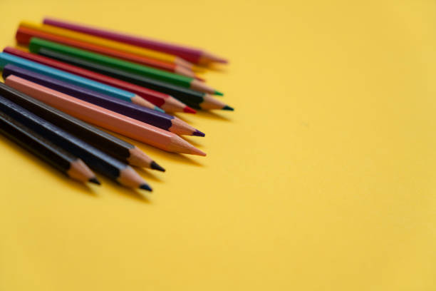 istock Colored pencils on the yellow background 2166733262