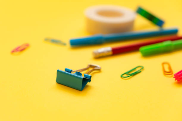 School supplies on yellow background