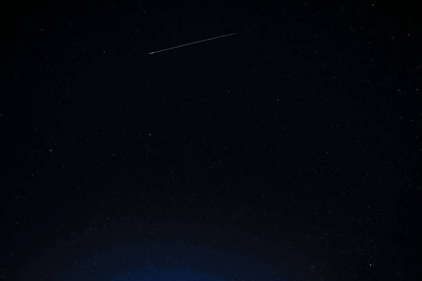 istock Perseid meteorite on a starry night 2166737386