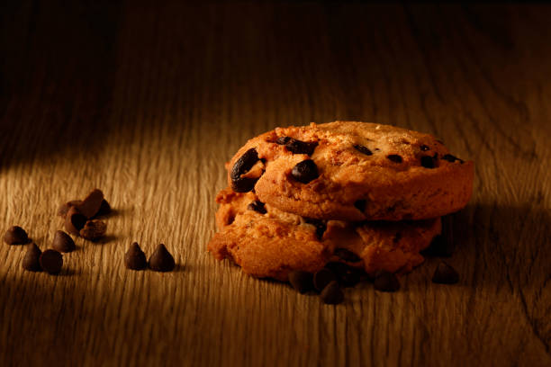 Decorated with chocolate chips on wooden texture surface