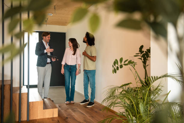 istock Diverse Team Discussing Digital 3D Renovation Plans 2166737947