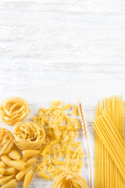 istock Italian Pasta on Rustic Wooden Table 2166741077