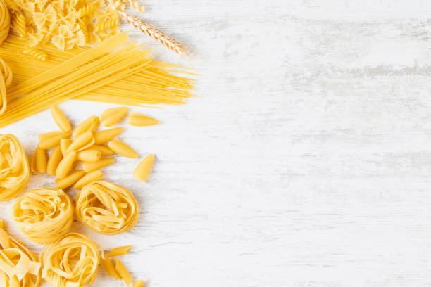 istock Italian Pasta on Rustic Wooden Table 2166743047