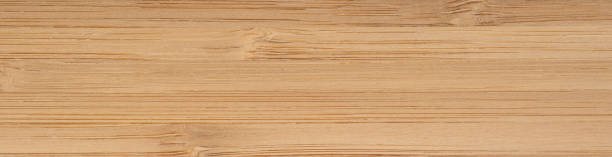 istock Dark bamboo veneer with narrow cane patterning and warm hues 2166743840