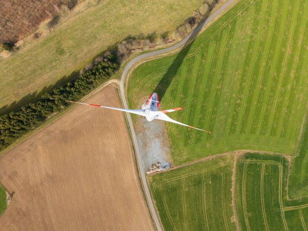 istock power generating wind turbines in the countryside 2166745757