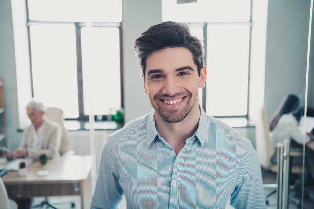 istock Photo of confident agent executive smiling camera in modern office 2166746078