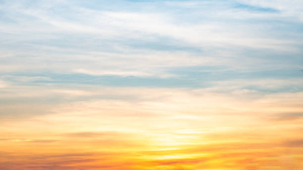 istock Beautiful , luxury soft gradient orange gold clouds and sunlight on the blue sky perfect for the background, take in everning,Twilight, Large size, high definition landscape photo 2166746569