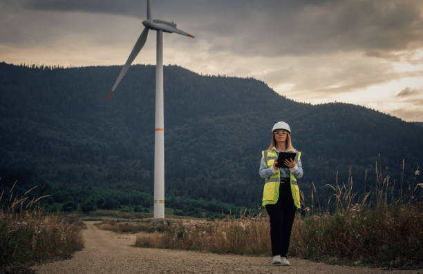 istock A dedicated Female Engineer at a Wind Farm is committed to creating innovative, sustainable energy solutions for a greener future and advancing accessible clean technology for all 2166747749