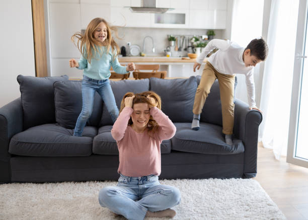 istock Mom brushing hair in frustration 2166748392