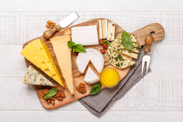 istock An assortment of various cheeses arranged on a board, highlighting different textures 2166750682