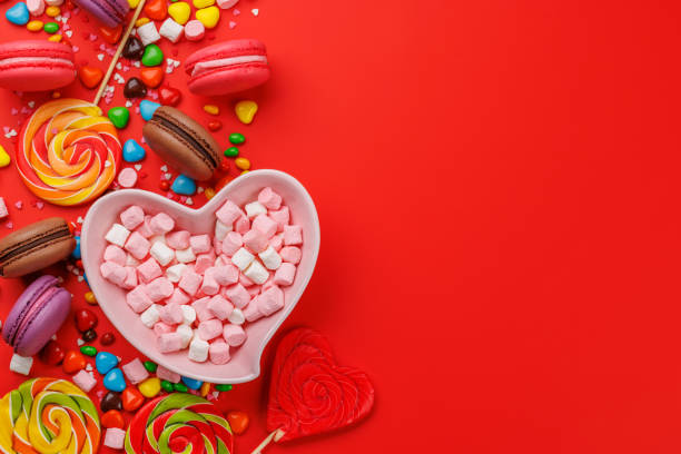 istock Various colorful candies, lollipops, and macaroons 2166751237