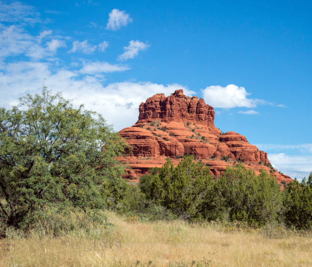 Driving the road into the city of Sedona, Arizona with red rocks all around