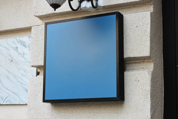 istock Blank blue cafe, shop, storefront or restaurant menu board mockup, white empty banner on a wall mock up template. 2166753277