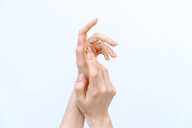 istock Two hands with long nails, one of which is slightly bent 2166754838