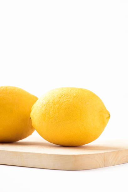 fresh Juicy Lemon Sliced Close-Up on Black Background studio shot on