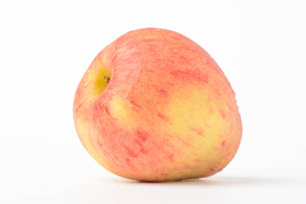 istock Fresh ripe apple with tiny water drops on white background 2166754857
