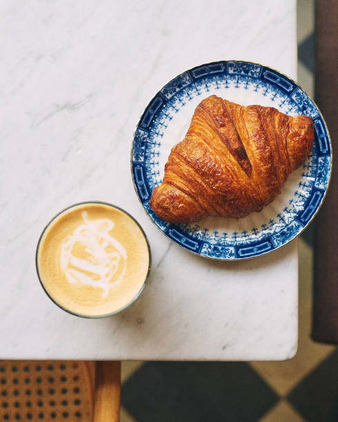 istock Croissant and coffee 2166755558