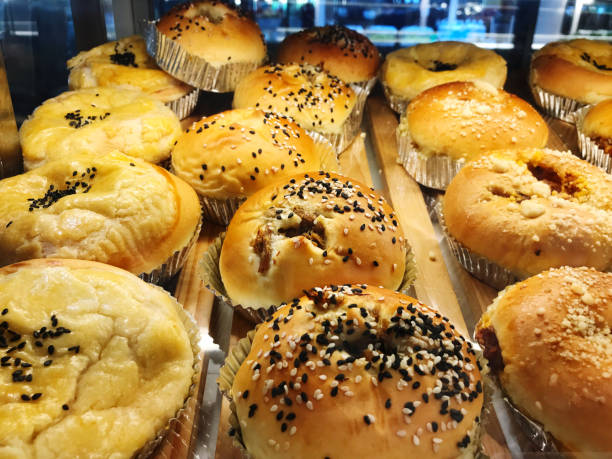 istock Bun with garlic and parsley on display in a bakery shop 2166756878