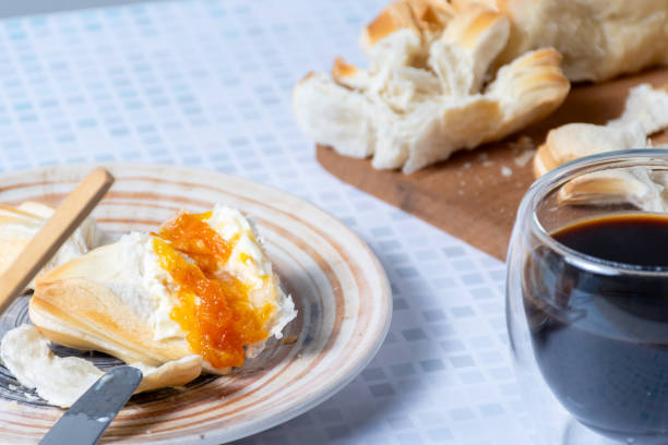 istock Breakfast or snack with bread, coffee, jam and white cheese. 2166757767