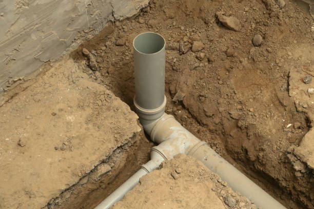 Process of installing PVC pipes sewage system in bathroom, DIY home renovation