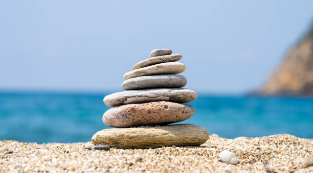 istock Stones balance on beach, zen concept 2166761959