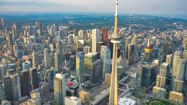 Aerial view of Toronto skyline from helicopter on a beautiful summer sunset, Ontario - Canada Aerial view of Toronto skyline from helicopter on a beautiful summer sunset, Ontario - Canada