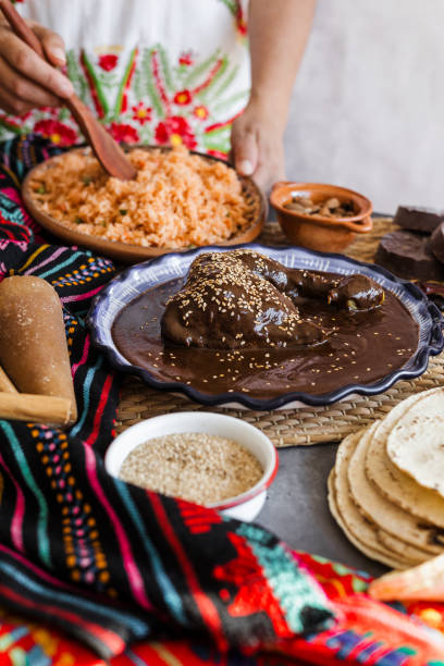 istock mole poblano is sauce with chicken mexican traditional food in Mexico Latin America 2166763607