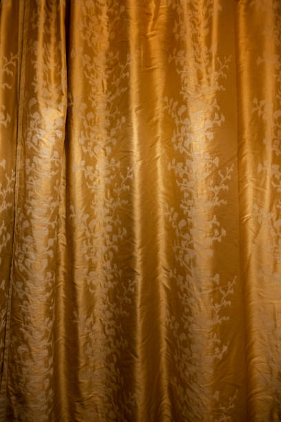 istock Golden curtain with floral pattern background 2166765744