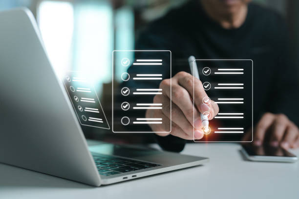 istock Electronic signatures, paperless workplaces, and document management Using a stylus pen on a digital tablet and a virtual notepad on a virtual screen, a businessman signs an electronic document. 2166767950