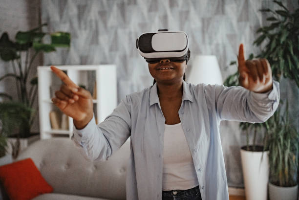 istock Person fully immersed in VR experience at home 2166768923