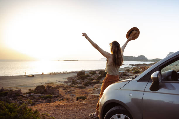 istock Summertime road trip. Young woman enjoying view 2166771433