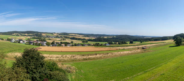 Horizontal panoramic color image of Eifel region landscape in Germany.