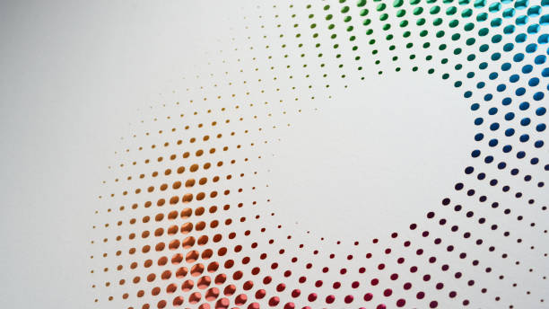 istock Subtle radial gradient pattern of colorful perforated dots on a clean white background design 2166772139