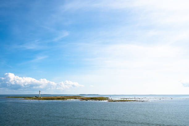 View of an uninhabited small island against the sky