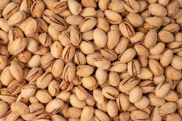 istock Tasty pistachios isolated on a white background. 2166773396