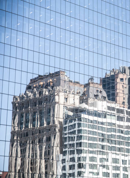 istock reflection of building in new york 2166777002
