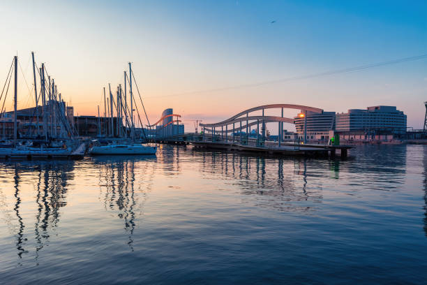 Barcelona, Spain, January 16, 2020: View of yachts and catamarans moored in Port Vell, which is an urban renewal area, part of the Port of Barcelona