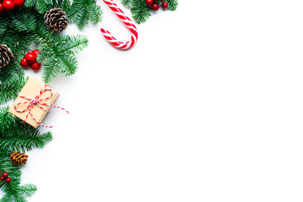 istock Christmas frame with fir tree and decoration on white background. Copy space 2166777918